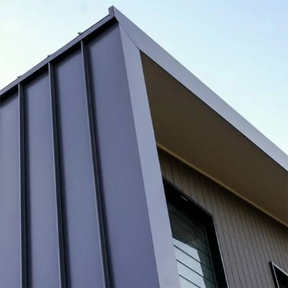 Grey interlocking vertical metal cladding