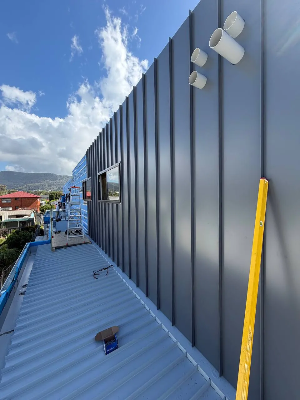 Grey architectural metal cladding on Wollongong home